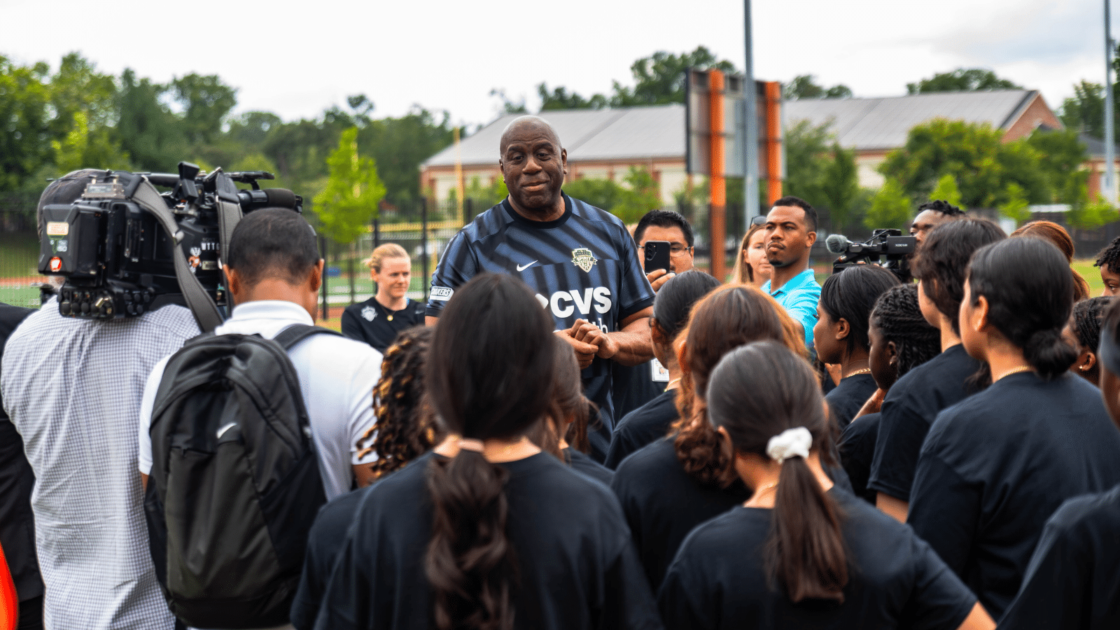 New Washington Spirit Investor Magic Johnson Introduced to Community at DC SCORES Practice